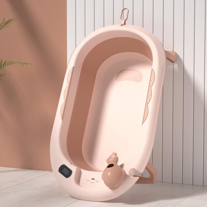 وان حمام کودک جمع‌شو پایه‌دار Ocean Bathtub مدل AST590 رنگ صورتی با طراحی کم‌جا و دماسنج دیجیتال